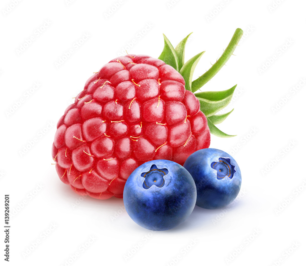 Isolated berries. One fresh raspberry and two blueberries isolated on white background with clipping