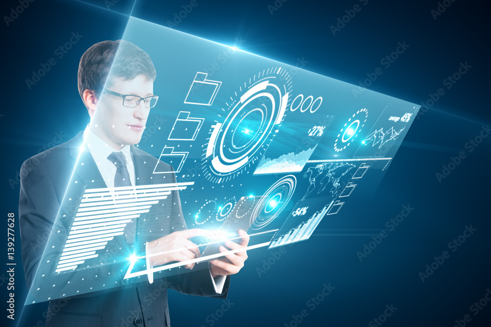 Businessman using tablet with charts