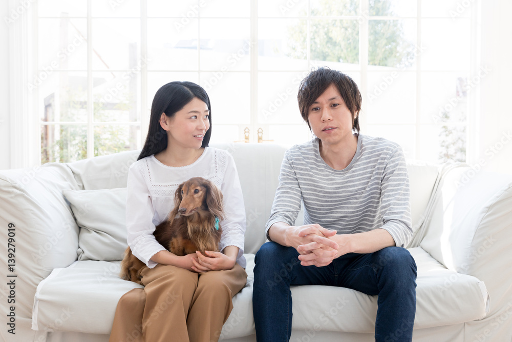 portrait of young asian couple in living room