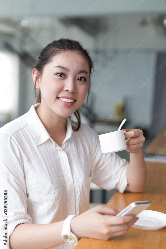 young pretty woman relaxes in office