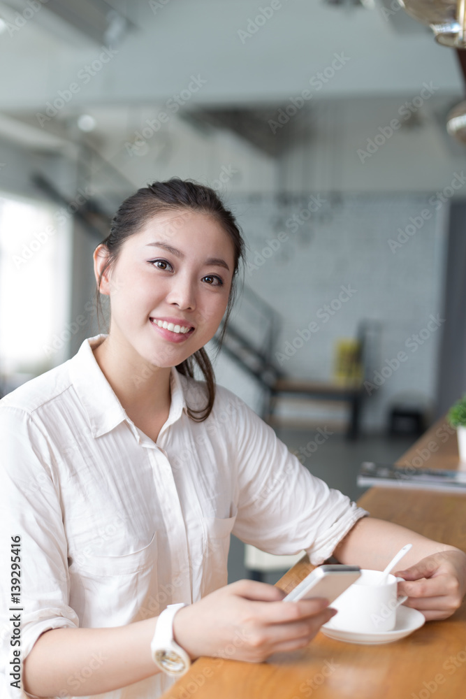 young pretty woman relaxes in office