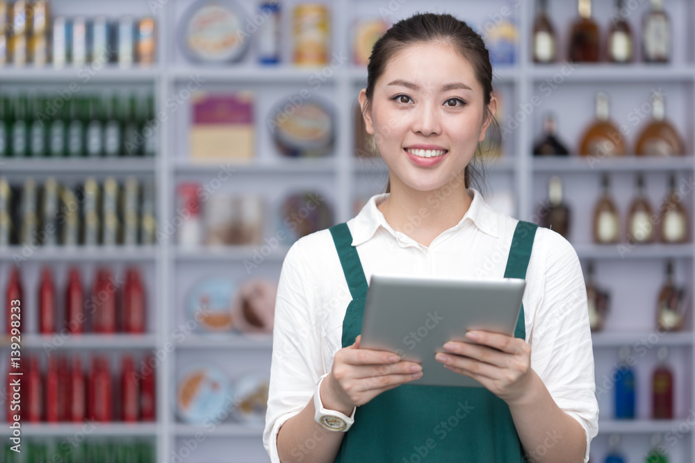 young pretty woman works in retail