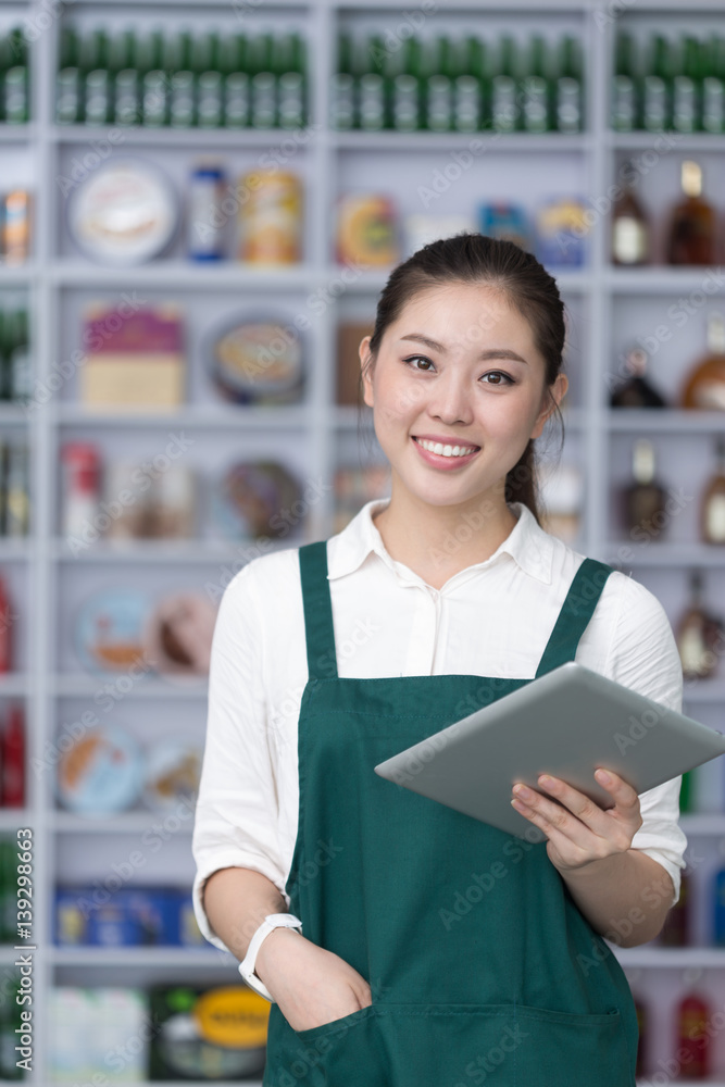 young pretty woman works in retail