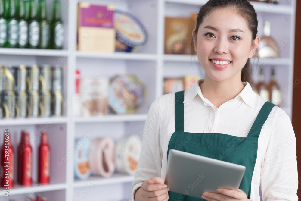 young pretty woman works in retail