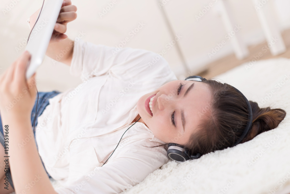 young pretty woman relaxes on blanket