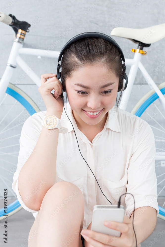 young pretty woman with bike