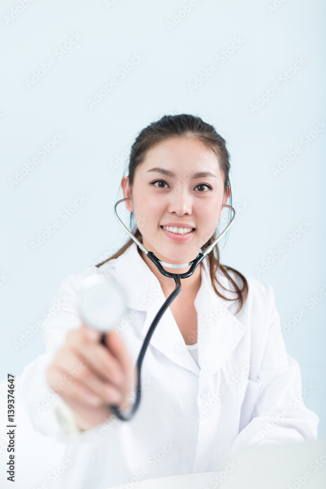 young pretty woman doctor in clinic