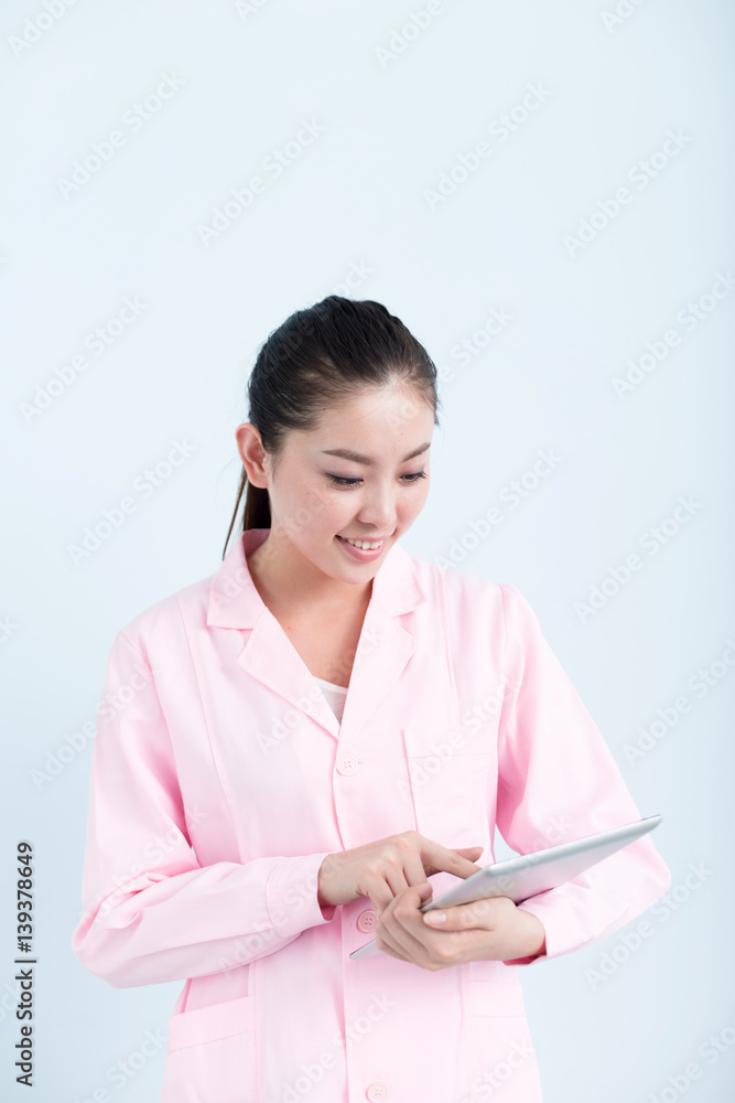 young pretty chinese woman nurse in hospital