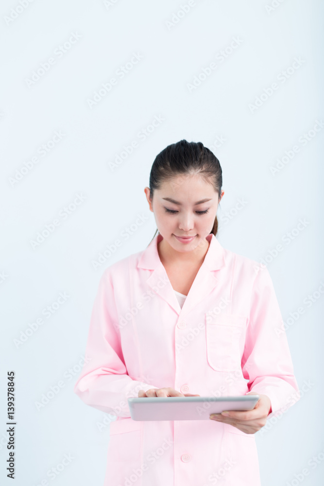 young pretty chinese woman nurse in hospital