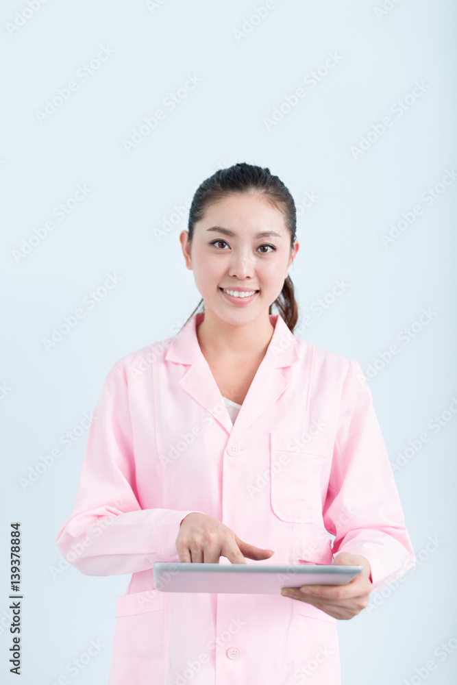 young pretty chinese woman nurse in hospital