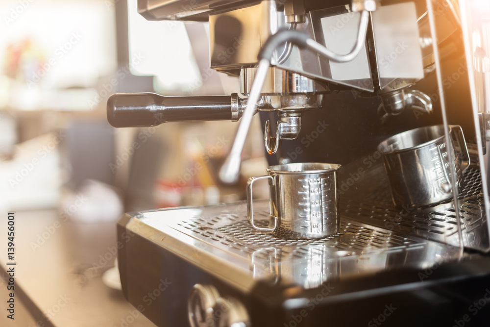 coffee making with coffee machine in cafe with color tone concept