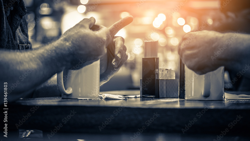 people meeting with coffee in coffee shop with blur background