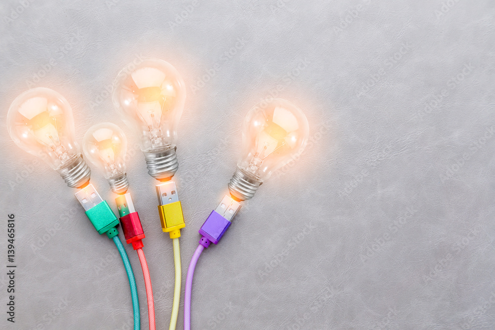 USB Cable with colorful with glow light bulb creativity ideas concept  with free copyspace