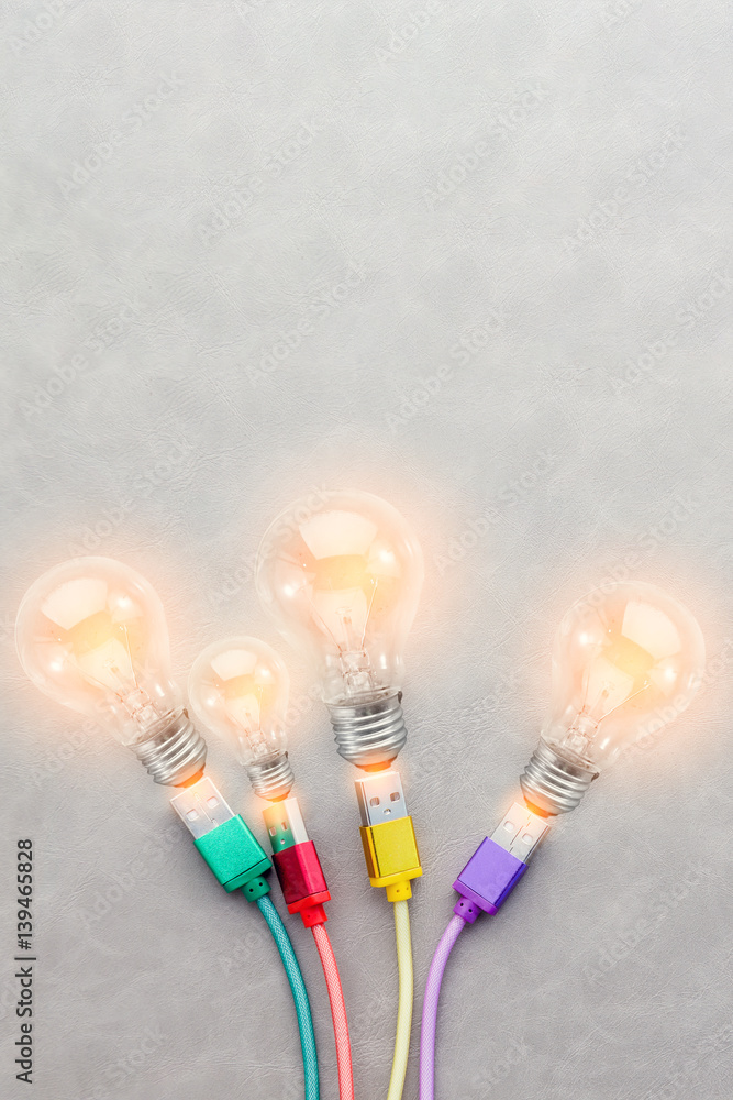 USB Cable with colorful with glow light bulb creativity ideas concept  with free copyspace