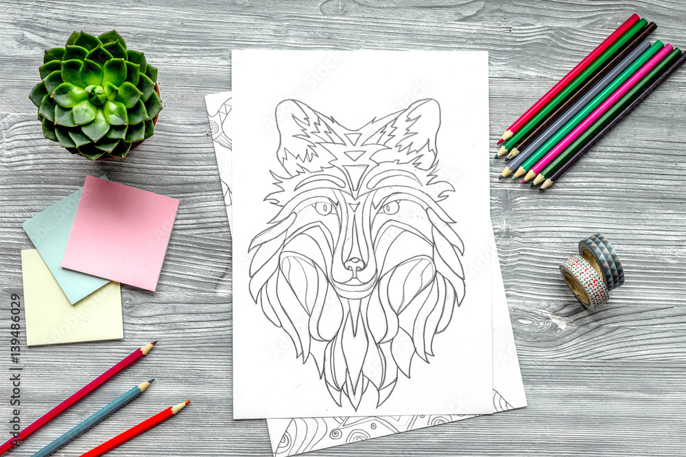 coloring picture for adults on wooden background top view