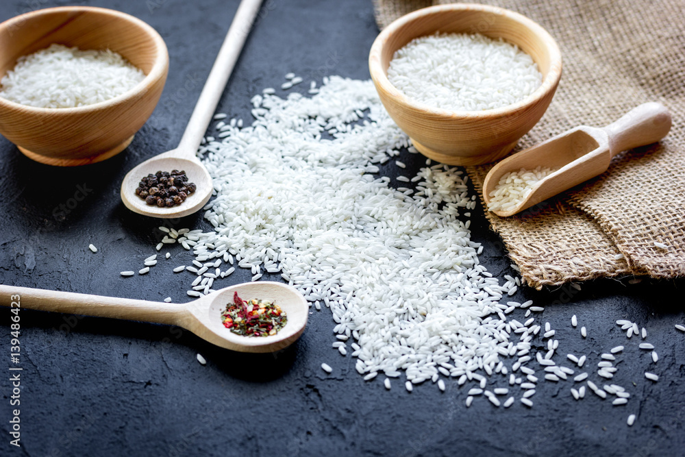 ingredients for paella on dark background