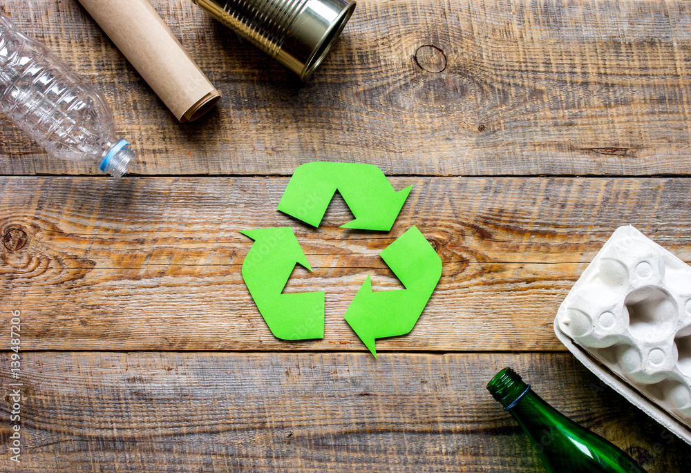 Eco concept with recycling symbol on table background top view mock-up