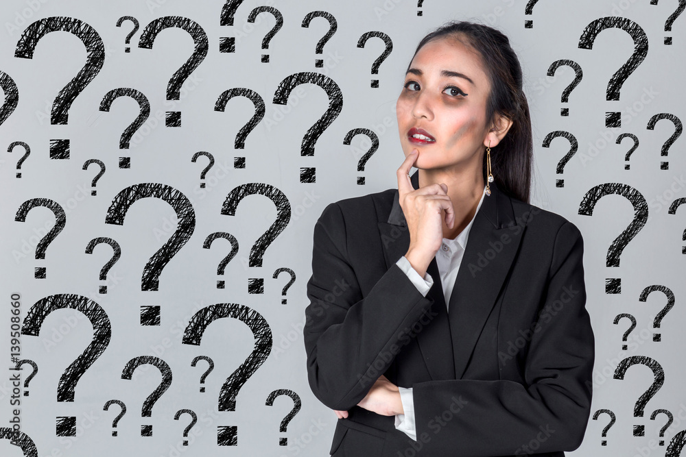 confused business girl with bad face and question mark symbol background