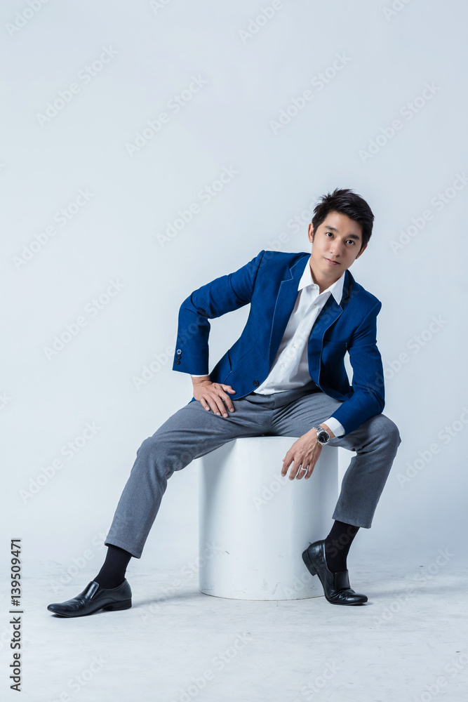 Smart asian business man isolated on white background