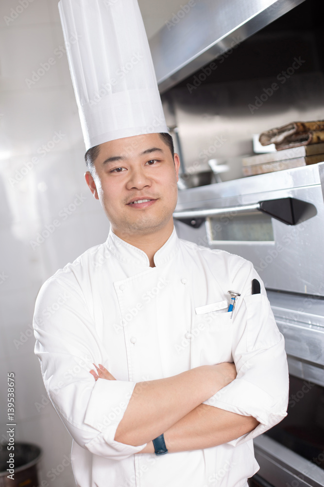 young man chelf in modern kitchen