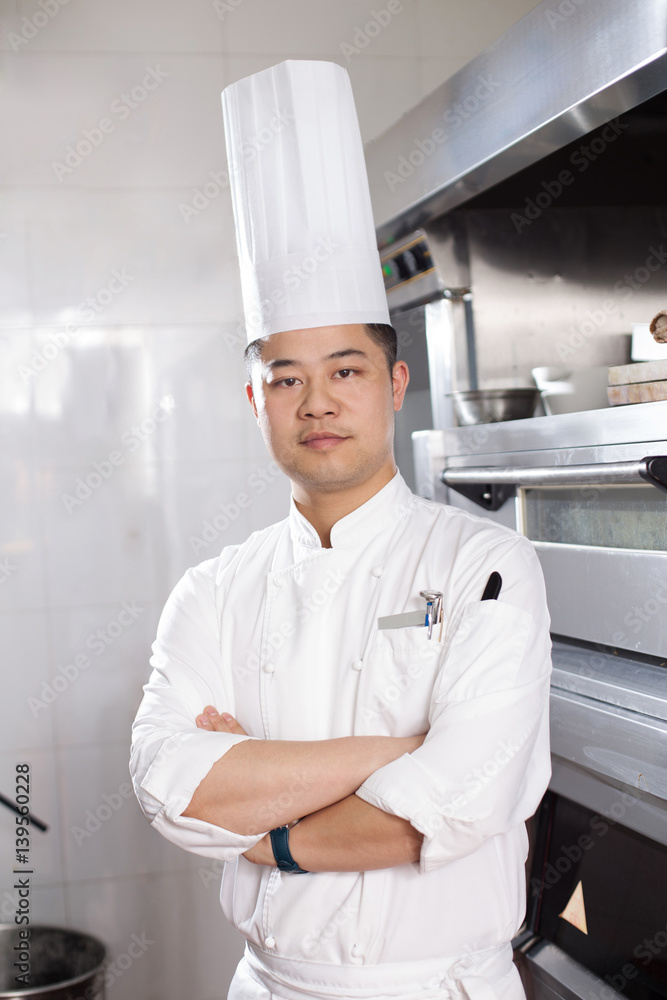 young man chelf in modern kitchen