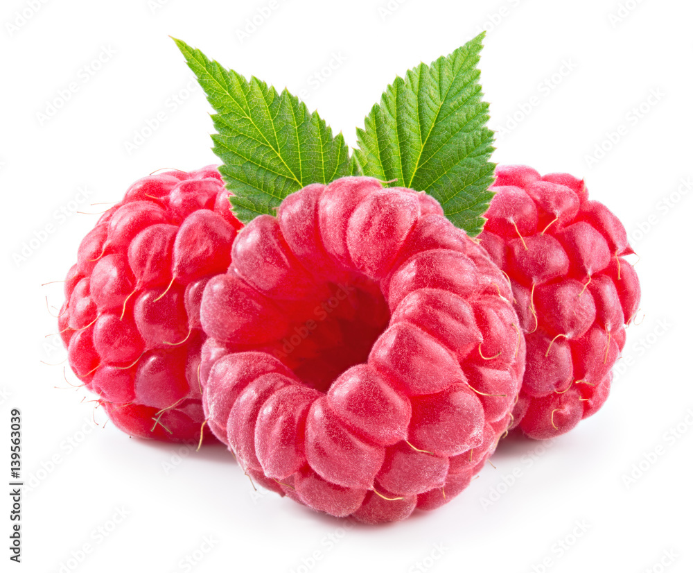 Raspberry with leaves isolated on white background.