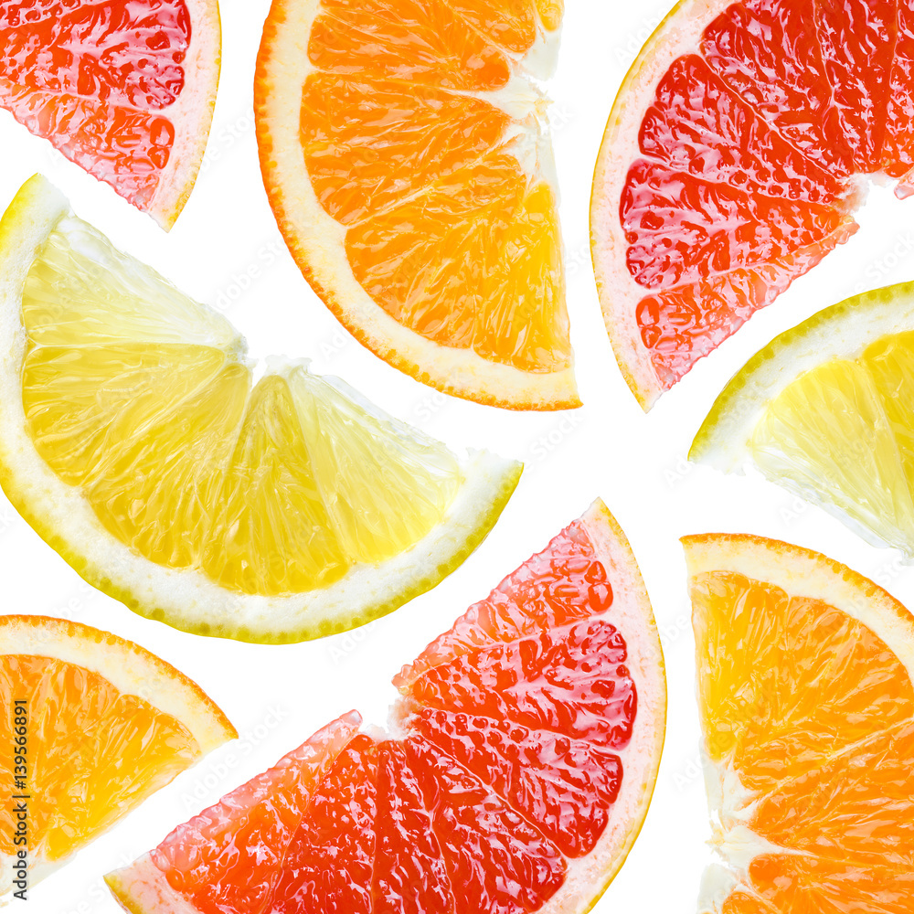 Citrus. Fruit background. Orange, lemon, grapefruit, slices isolated on white.