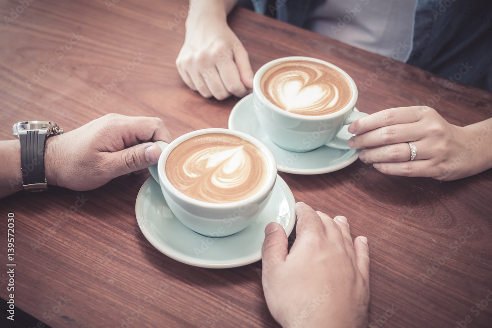 A couple having coffee at cafe