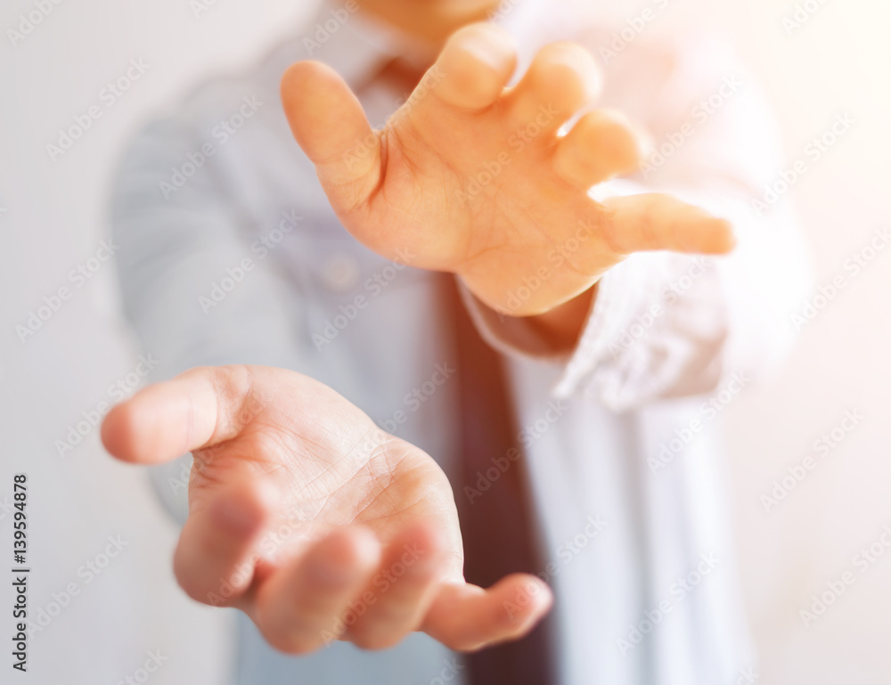 Businessman showing his empty hand