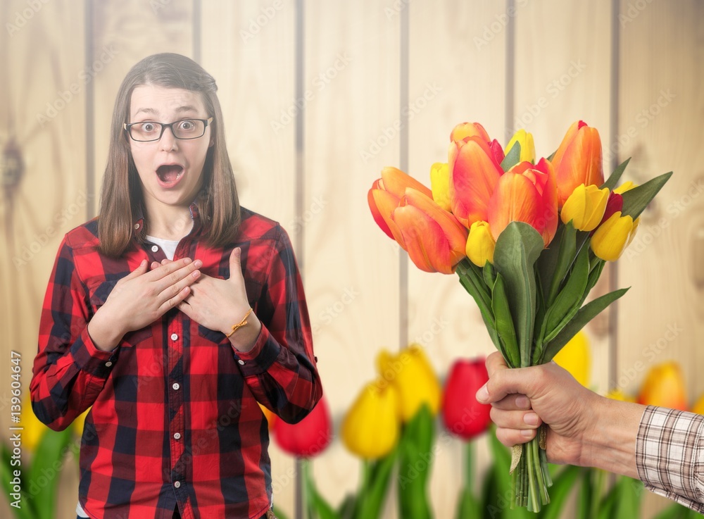 Woman and flowers.