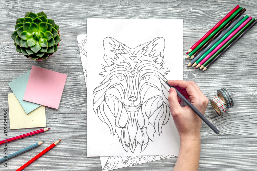 coloring picture for adults on wooden background top view