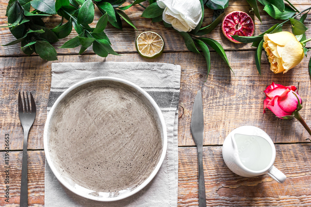 ceramic tableware top view on wooden background mock up