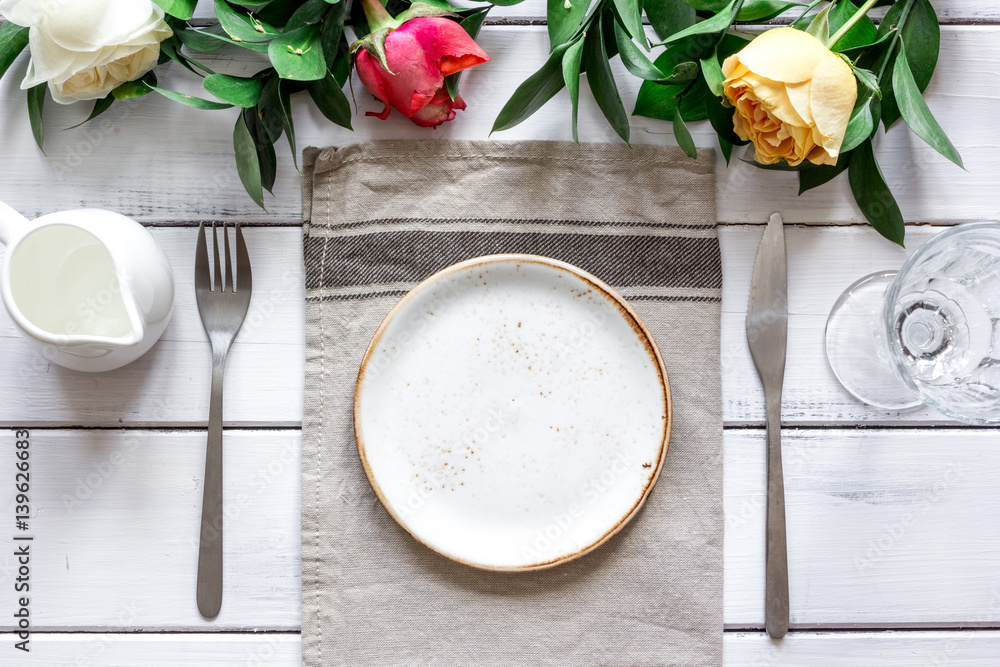 ceramic tableware top view on wooden background mock up