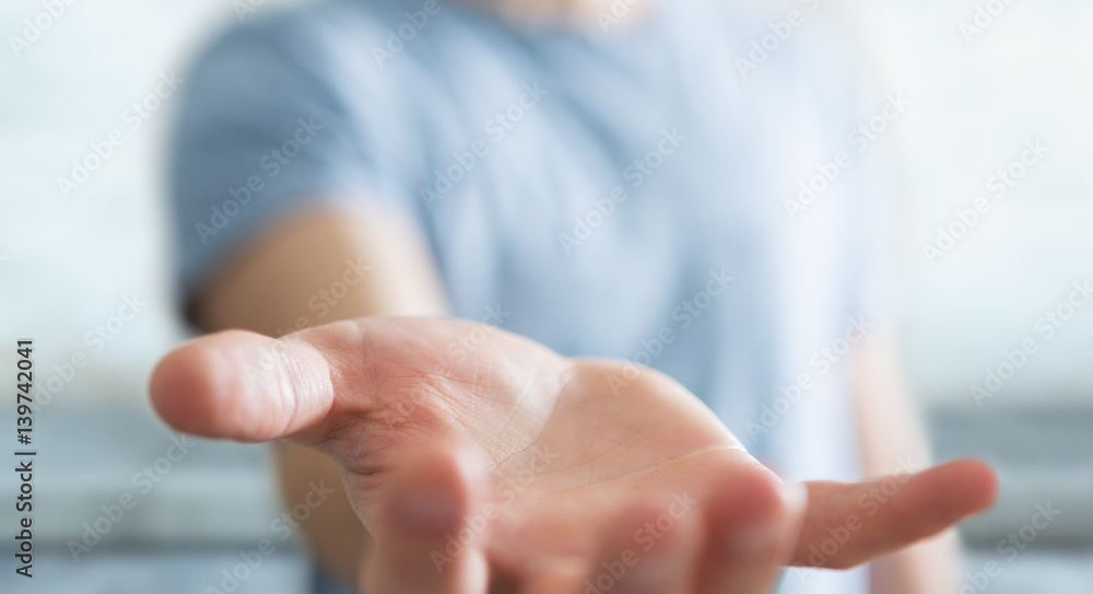 Businessman showing his empty hand