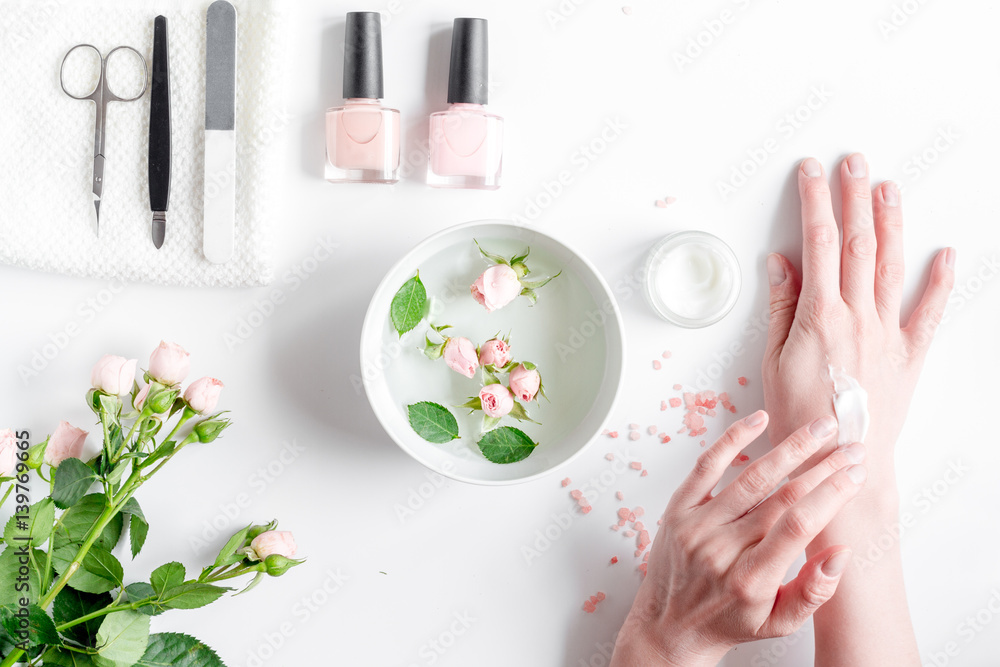 salt and cream for nail care in spa top view