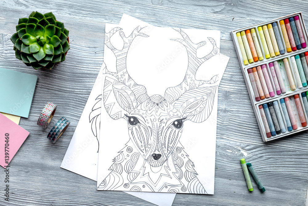 coloring picture for adults on wooden background top view