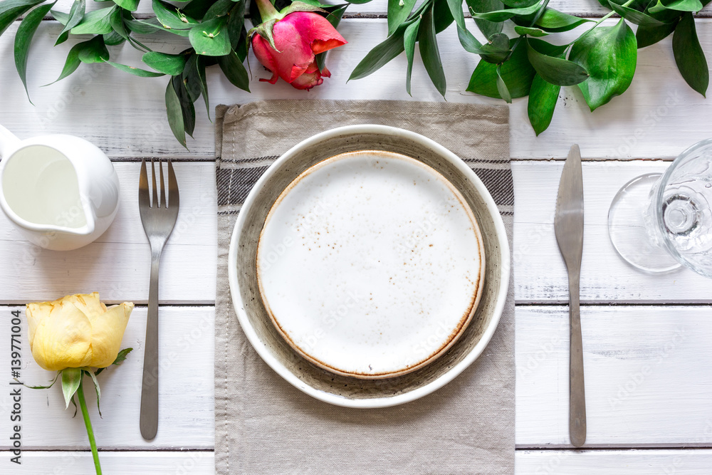 ceramic tableware top view on wooden background mock up