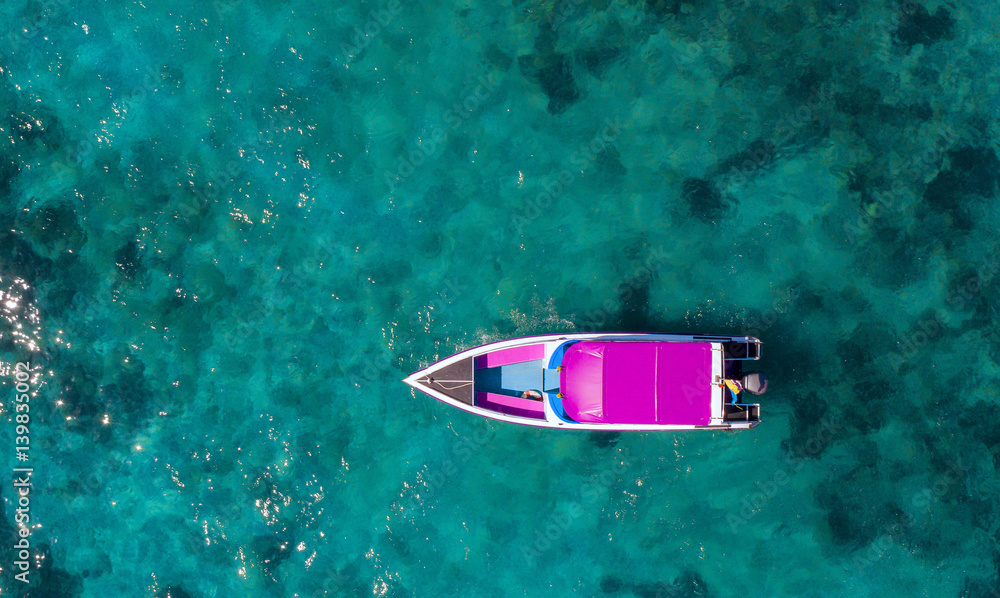 Speed boat in the sea.Aerial view. Top view.amazing nature background.The color of the water and bea