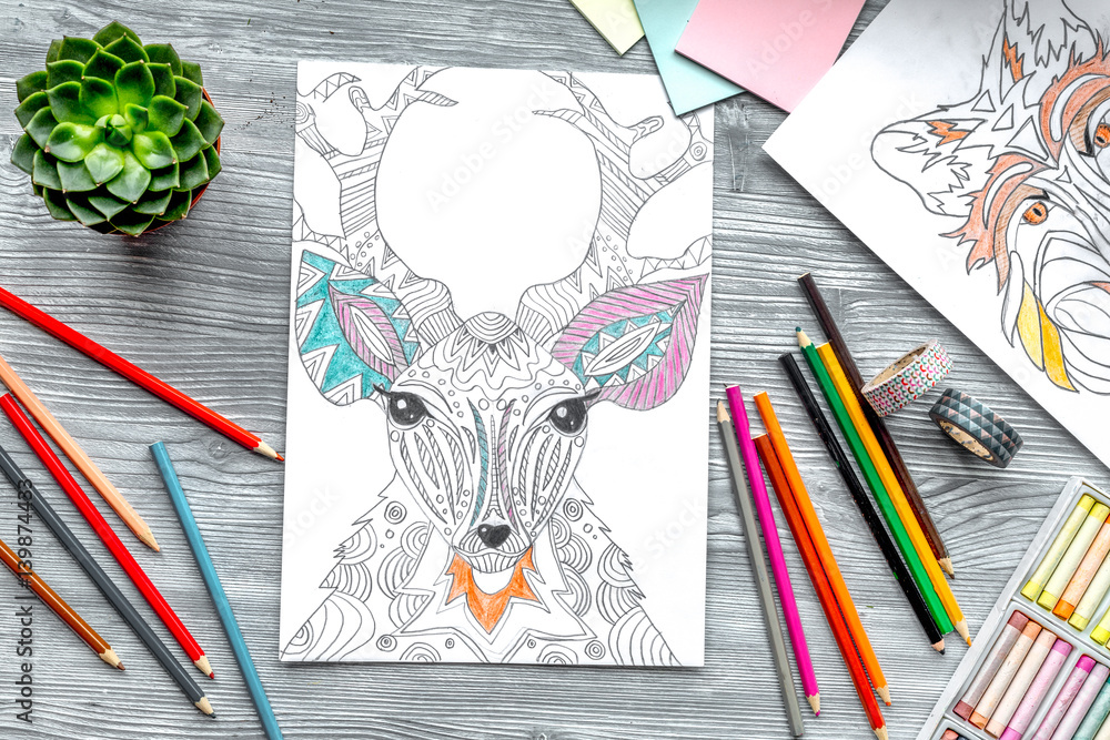 coloring picture for adults on wooden background top view