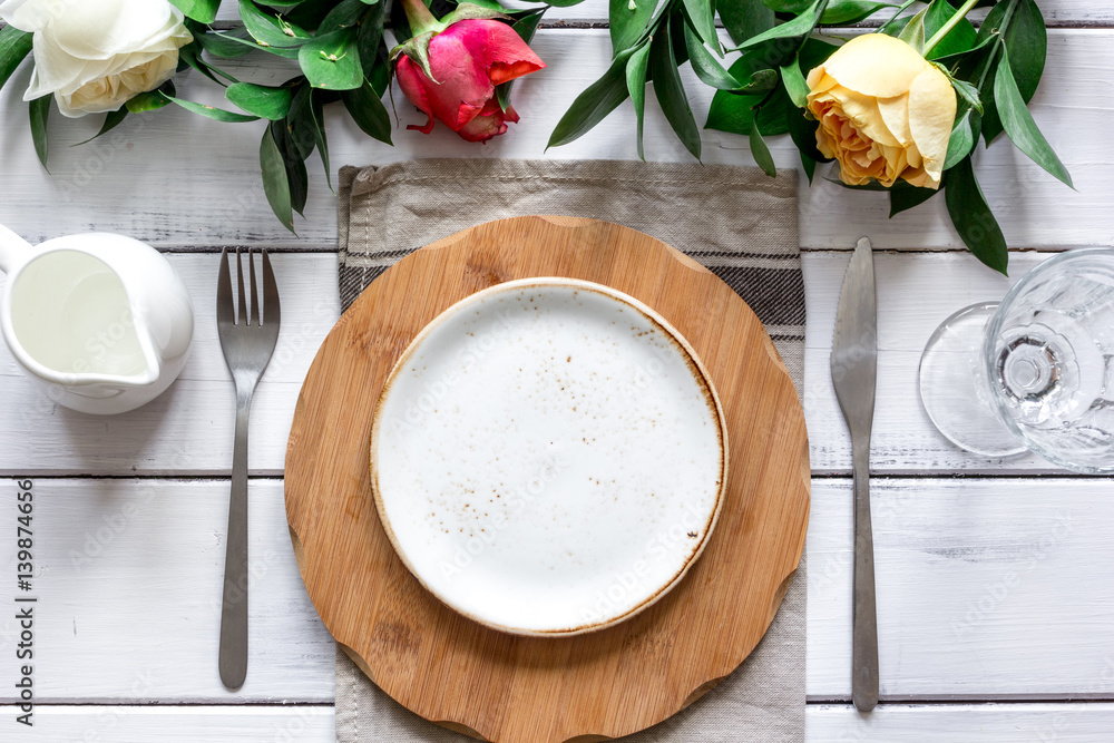 ceramic tableware top view on wooden background mock up