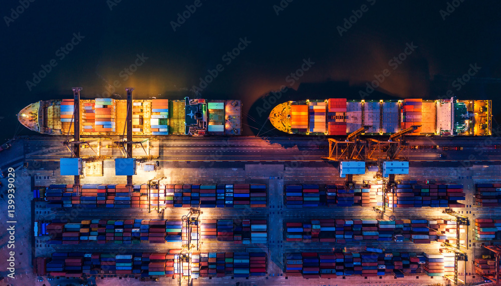 container ship in import export and business logistic.By crane ,Trade Port , Shipping, cargo to harb