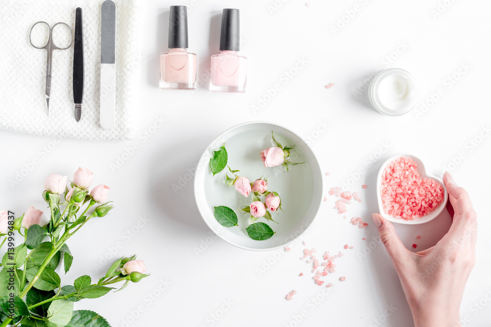 salt and cream for nail care in spa top view