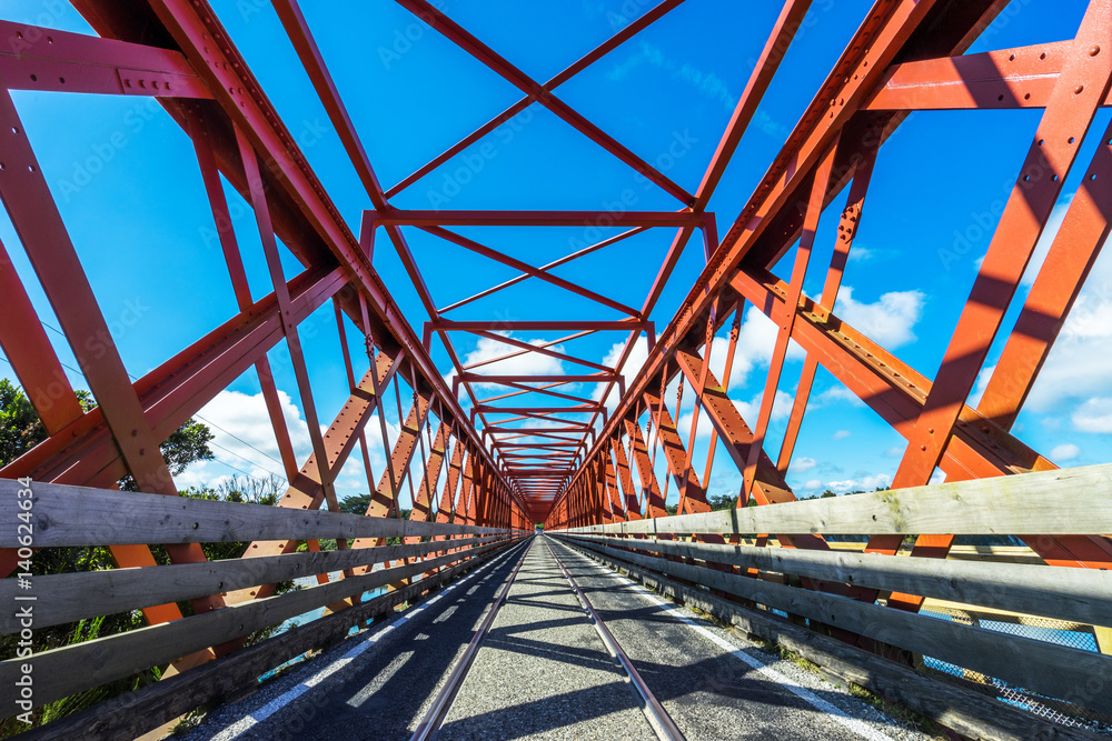 old abandoned railway bridge with steel construction