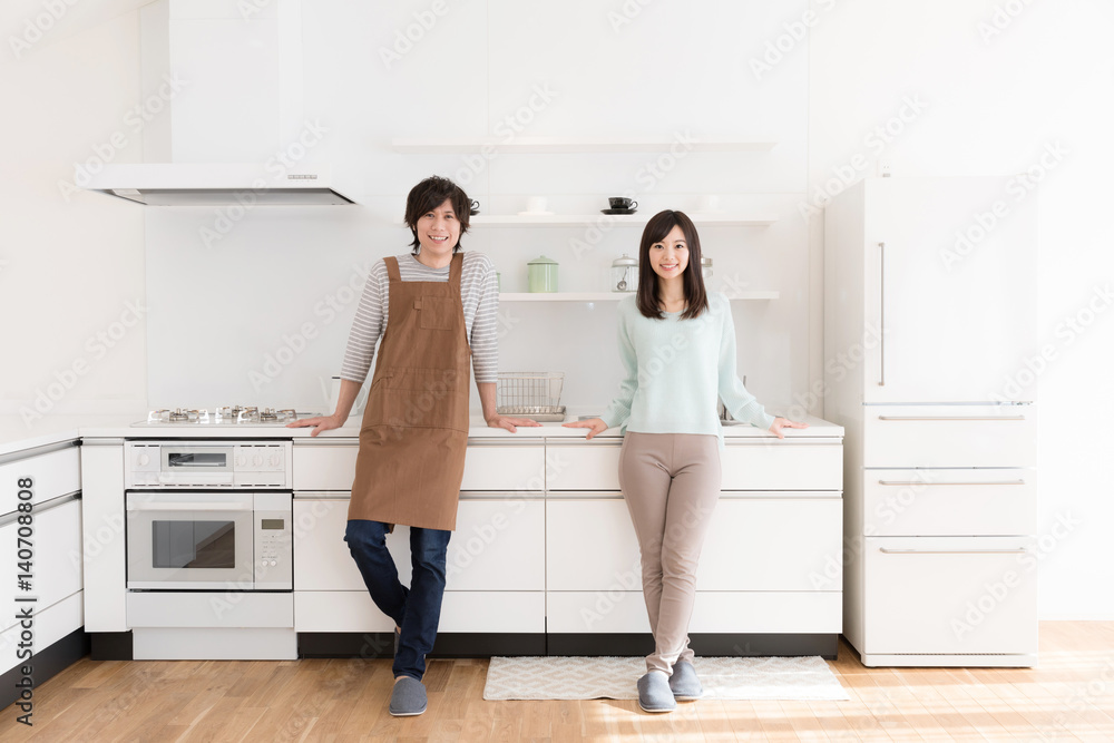 young asian couple in modern kitchen