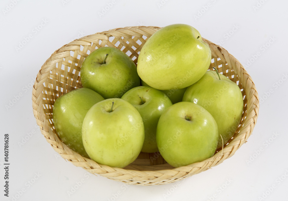 Jujube in a basket isolated on white background