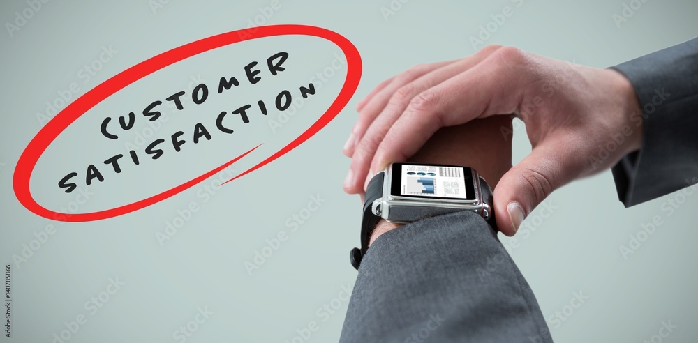 Composite image of businessman checking smart watch