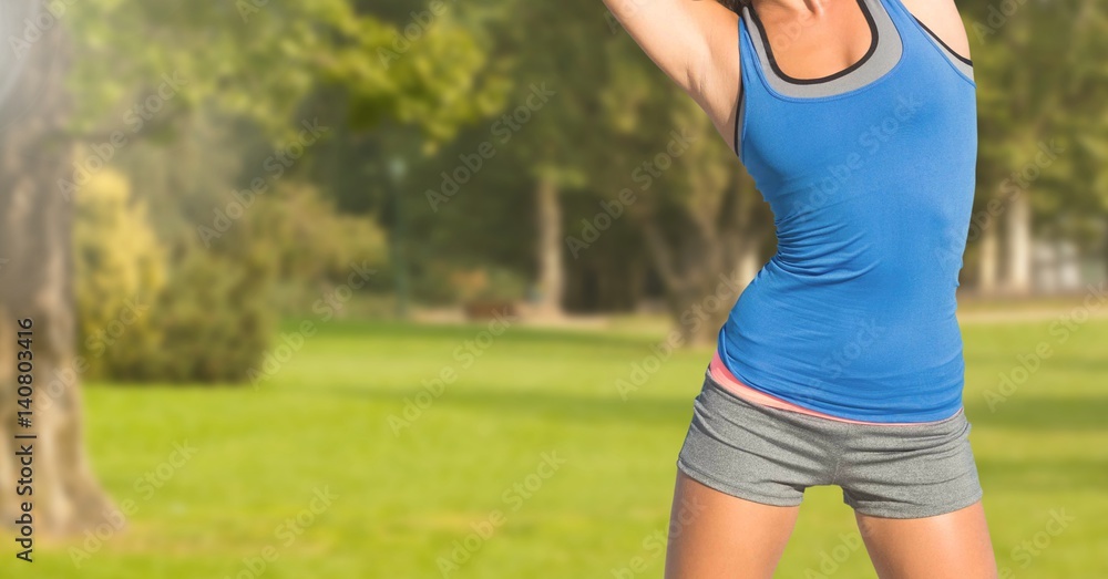 Fitness woman Torso making exercises in a park