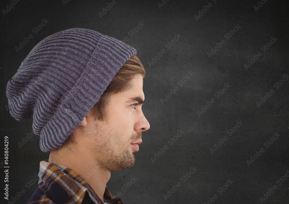 Man in beanie against grey background