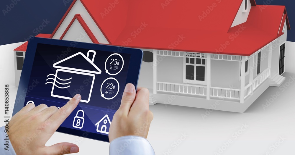 Hands using digital tablet with home security icons