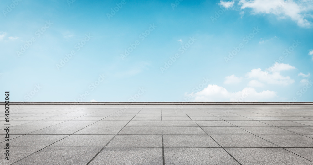 empty brick floor and blue sky